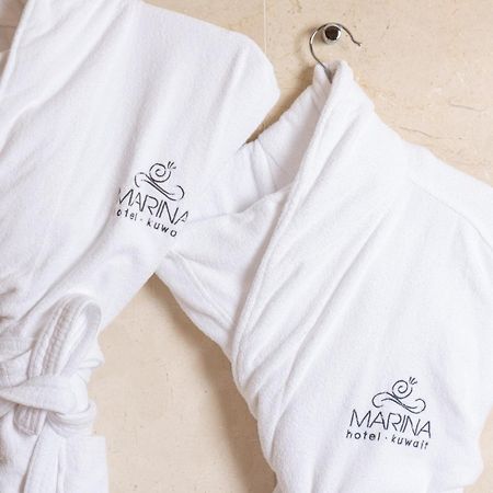 Marina Hotel Kuwait City Exterior foto A bathrobe